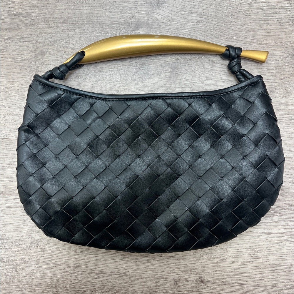 Elegant Black Woven Handbag with Gold Handle
